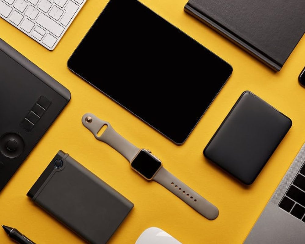 flat-lay-with-different-wireless-devices-on-yellow-2026-01-06-00-42-26-utc 1